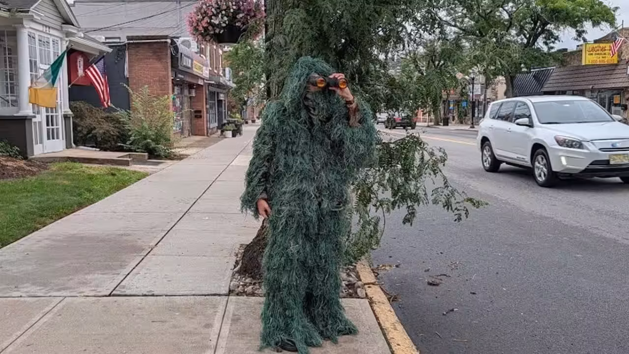New Jersey police officer disguised as a roadside tree catch 74 distracted drivers