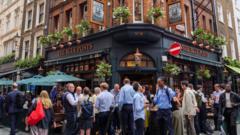 Why there is a row about standing up while drinking in central London